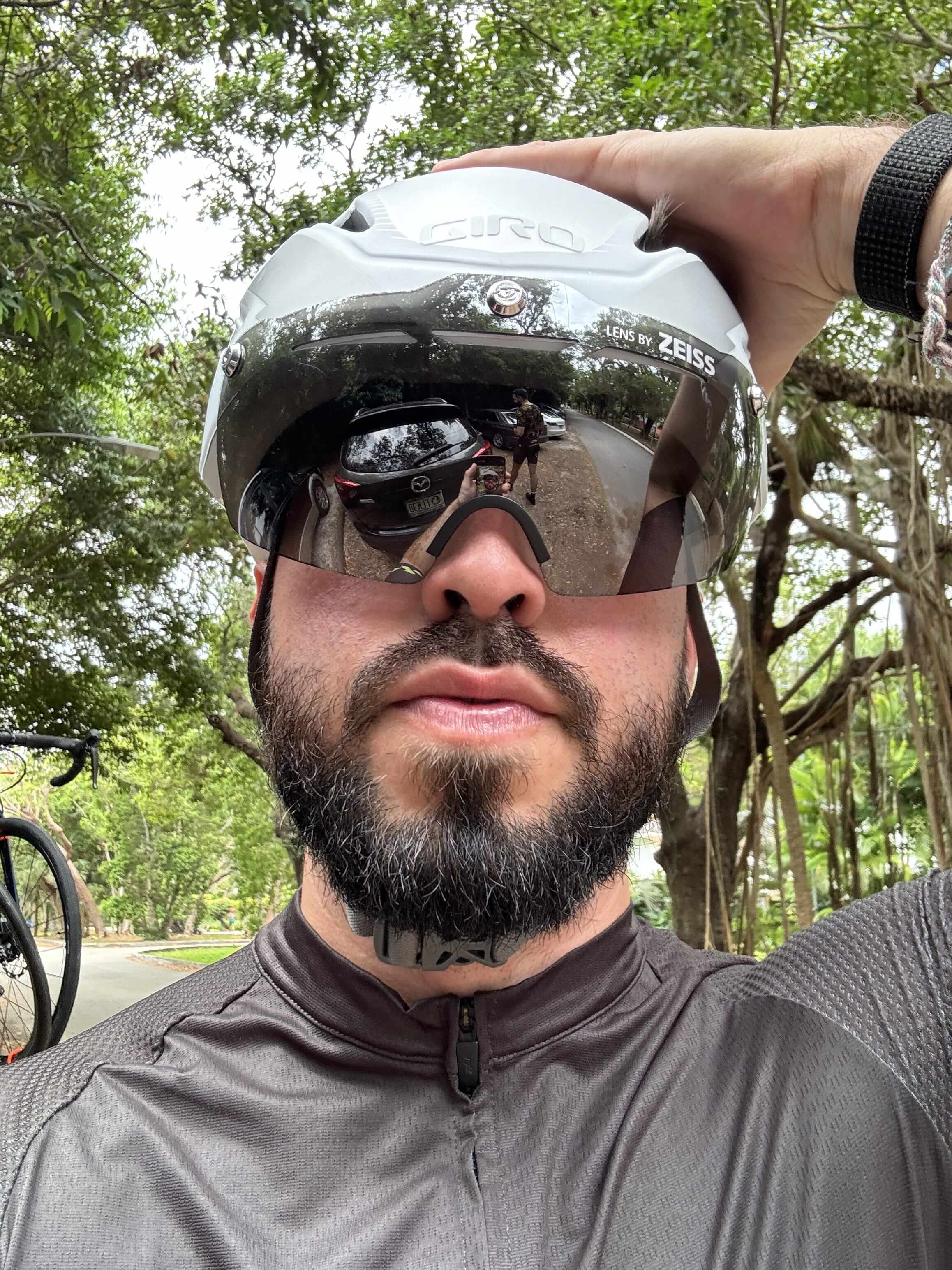 Daniel wearing cycling gear and reflective sunglasses